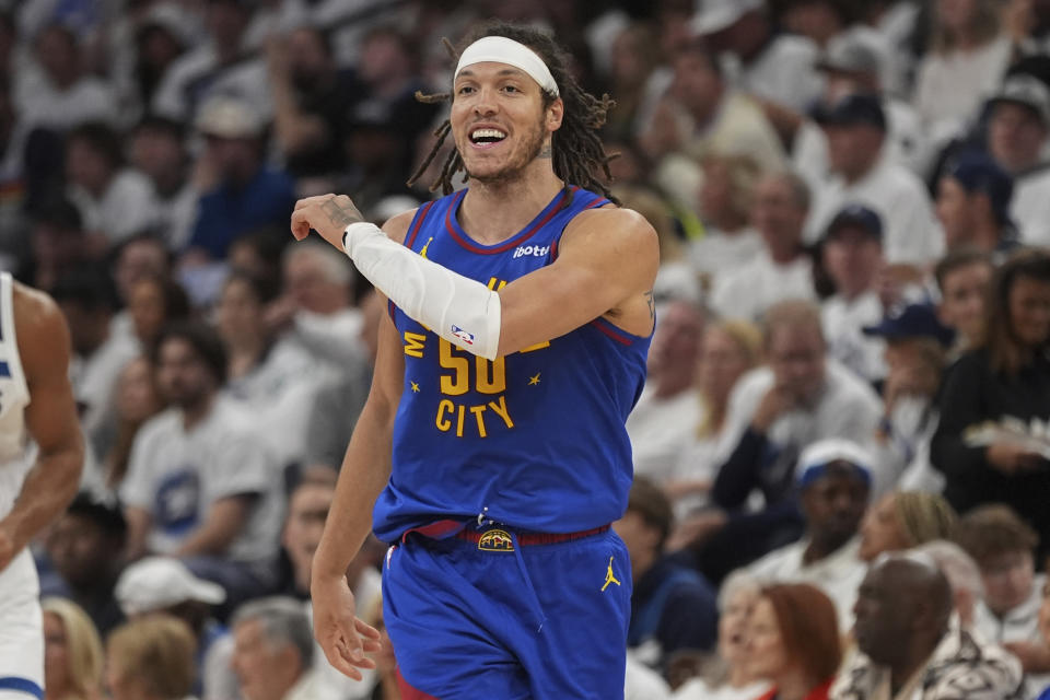 Denver Nuggets forward Aaron Gordon celebrates after making a 3-point basket during the second half of Game 3 of an NBA basketball second-round playoff series against the Minnesota Timberwolves, Friday, May 10, 2024, in Minneapolis. (AP Photo/Abbie Parr)