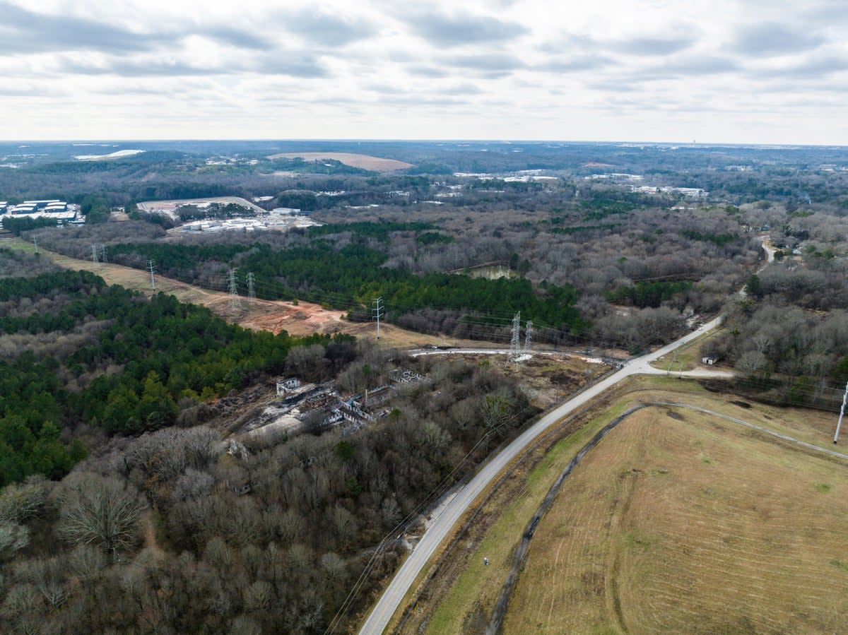 The Atlanta City Council has approved plans to lease a plot land to the Atlanta Police Foundation so it can build a state-of-the-art police and firefighter training center, a project that critics call ‘Cop City’ ((AP Photo/Danny Karnik))