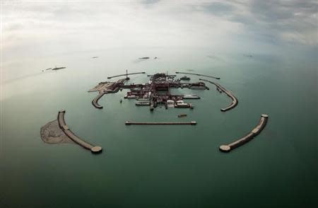 An aerial view shows artificial islands on Kashagan offshore oil field in the Caspian sea, western Kazakhstan, April 7, 2013. Picture taken April 7, 2013. REUTERS/Anatoly Ustinenko