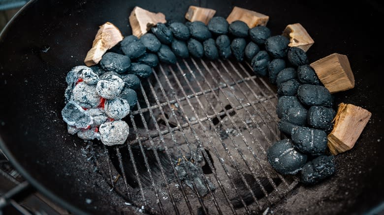 briquettes laid out on grill