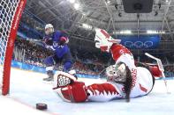 <p>Michael Heiman, Senior Director, Editorial Operations Photo 1 & 2- Bruce Bennett</p><p>By using a remote camera mounted on the back of the hockey net, veteran hockey photographer Bruce Bennett was able to capture a unique angle of the game that no actual photographer could ever do.</p>