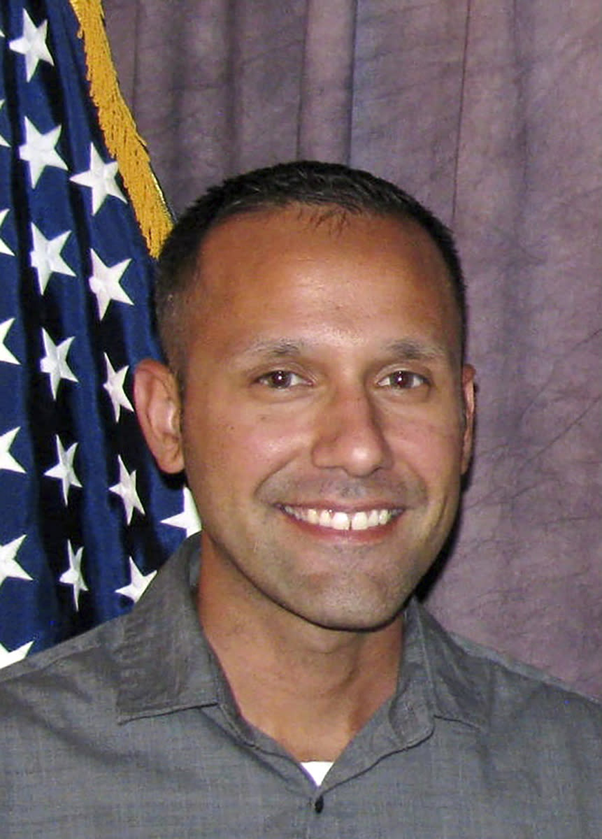 In this undated photo provided by the Boulder Police Department, is Boulder, Colo., officer Richard Steidell. A man charged with killing 10 people at a Colorado supermarket surrendered after being shot by Steidell, who waited for him to come into view down a store aisle, according new information about the shooting released Thursday, May 6, 2021. The details were contained in a district attorney's report that found Steidell was justified in shooting Ahmad Alissa and said his shots stopped the attack. (Boulder Police Department via AP)