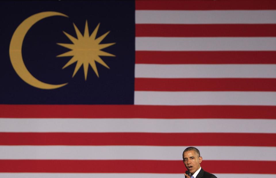 U.S. President Barack Obama speaks at a town hall style event at the University of Malaya with participants in the Young Southeast Asian Leaders Initiative in Kuala Lumpur, Malaysia, Sunday, April 27, 2014. With the first visit to Malaysia by a U.S. president in nearly half a century, Obama holds economic and security talks with Malaysian Prime Minister Najib Razak, who leads a southeast Asian nation with an important role in Obama's efforts to forge deeper ties with the region. (AP Photo/Lai Seng Sin)