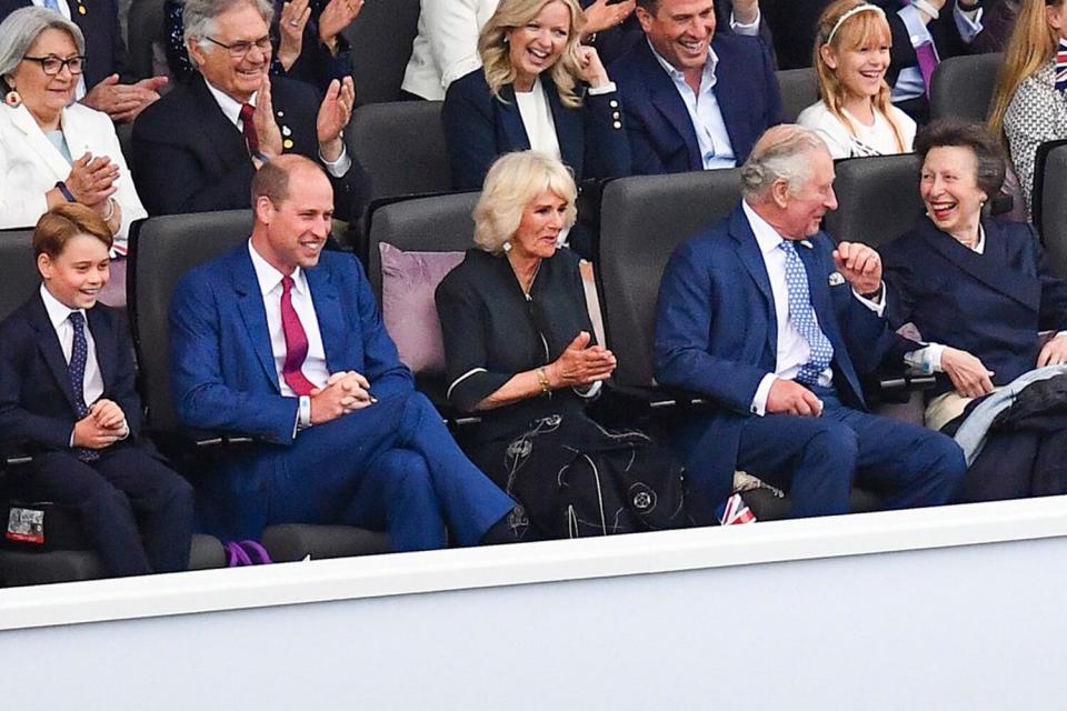 Front row from right, Tim Lawrence, Princess Anne, Prince Charles, Camilla, Duchess of Cornwall, Prince William, Prince George, Princess Charlotte, Kate, Duchess of Cambridge watch the Platinum Jubilee concert taking place in front of Buckingham Palace