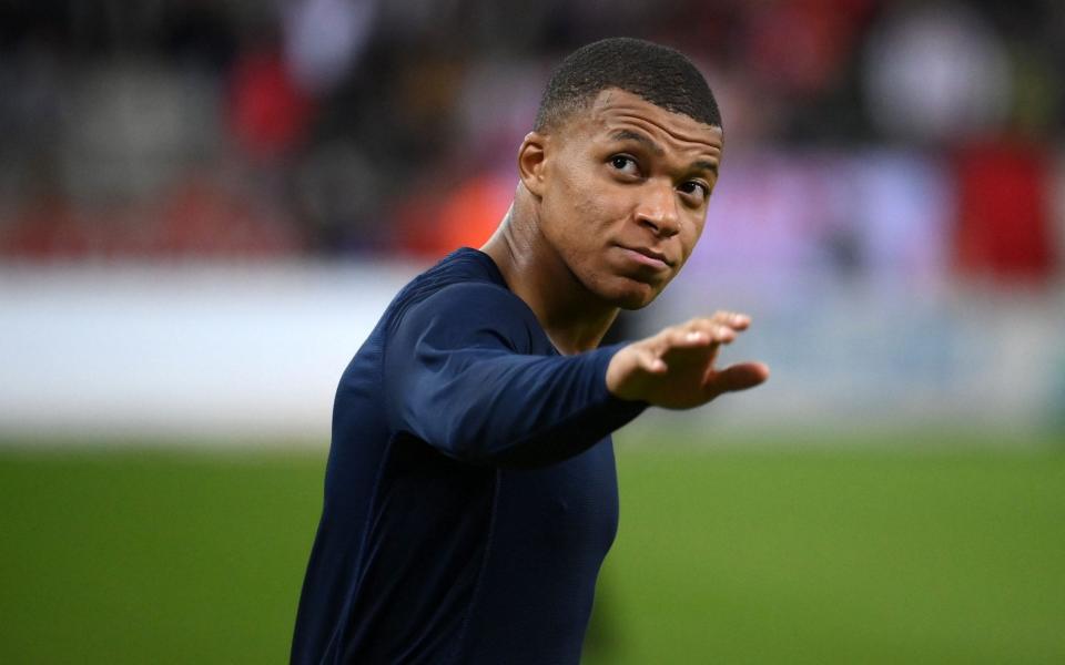 Paris Saint-Germain's French forward Kylian Mbappe reacts during the French L1 football match between Stade de Reims and Paris Saint-Germain at Auguste Delaune Stadium in Reims on August 29, 2021 - AFP/FRANCK FIFE 