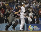 United States' Buster Posey reacts after Japan's Nobuhiro Matsuda strikes out for the final out of a semifinal in the World Baseball Classic in Los Angeles, Tuesday, March 21, 2017. United States defeated Japan 2-1. (AP Photo/Chris Carlson)