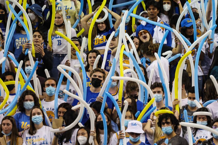 Westwood, CA, Saturday, February 19, 2022 - Fun with balloons in the student section as UCLA plays the Washington Huskies at Pauley Pavilion. (Robert Gauthier/Los Angeles Times)