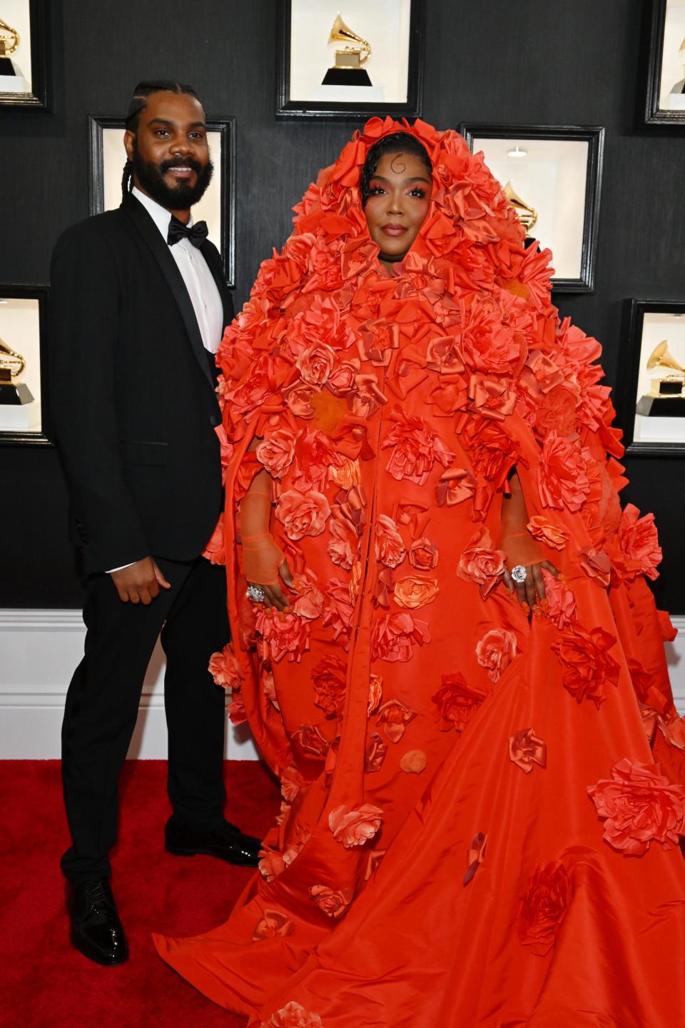 Myke Wright and Lizzo attend the 2023 Grammy Awards.