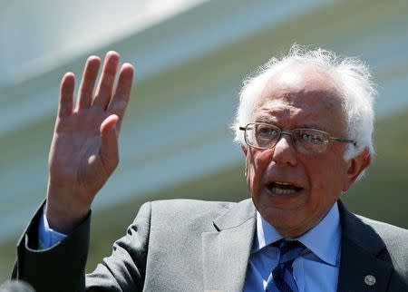 Democratic presidential candidate Bernie Sanders delivers a statement after his meeting with U.S. President Barack Obama (not pictured) at the White House in Washington, U.S. June 9, 2016. REUTERS/Gary Cameron