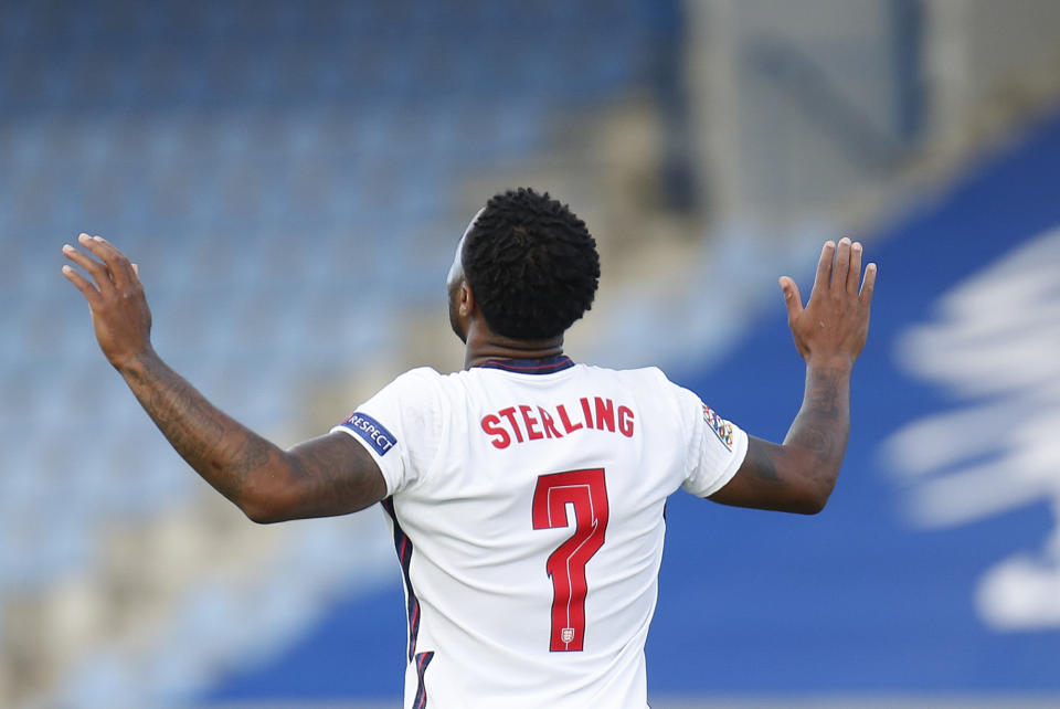England's Raheem Sterling celebrates after scoring the opening goal from the penalty spot during the UEFA Nations League soccer match between Iceland and England in Reykjavik, Iceland, Saturday, Sept. 5, 2020. (AP Photo/Brynjar Gunnarson)