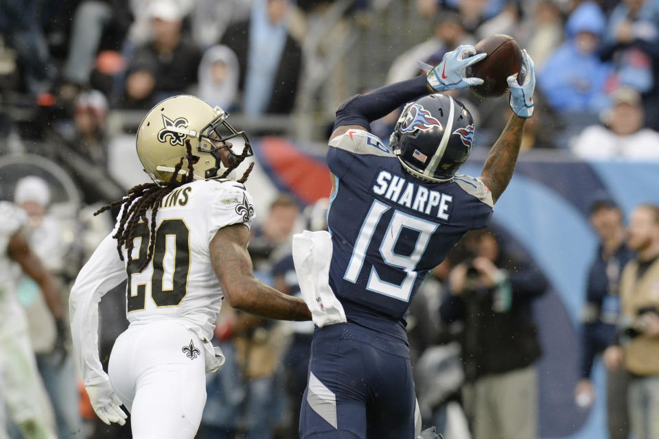 Tennessee Titans wide receiver Tajae Sharpe (19) catches a 7-yard touchdown pass against New Orleans Saints cornerback Janoris Jenkins (20) in the second half of an NFL football game Sunday, Dec. 22, 2019, in Nashville, Tenn. (AP Photo/Mark Zaleski)