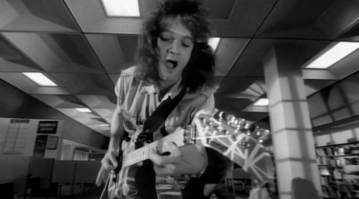  Eddie Van Halen plays a Kramer guitar in the music video for Van Halen's Hot for Teacher 