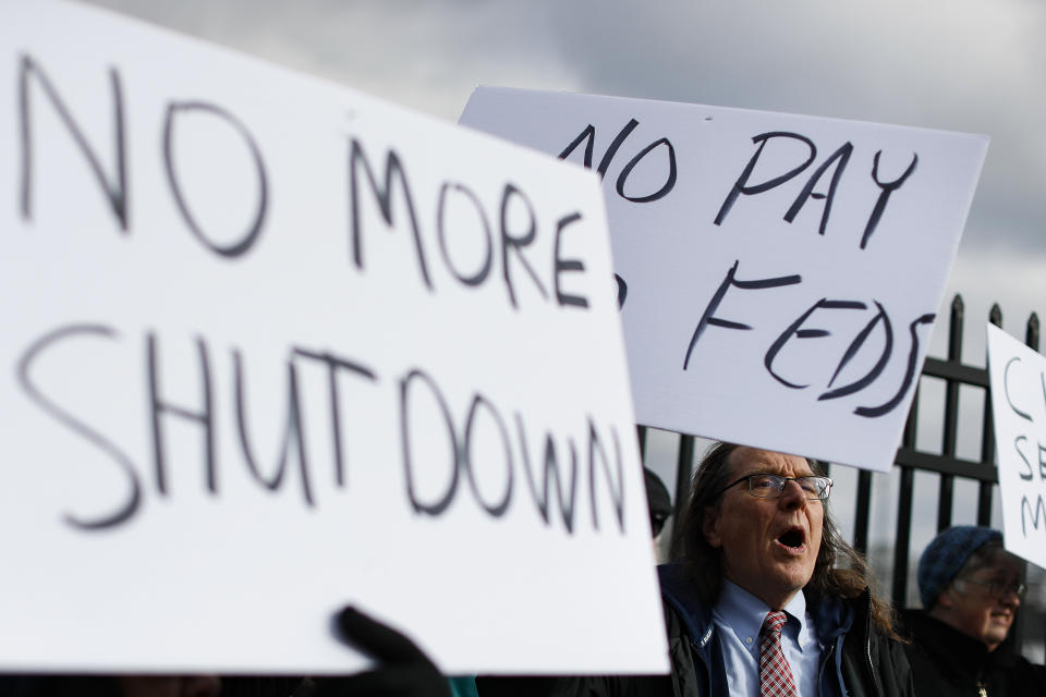 Union members and Internal Revenue Service workers rally outside an IRS Service Center to call for an end to the partial government shutdown, Thursday, Jan. 10, 2019, in Covington, Ky. (Photo: John Minchillo/AP)