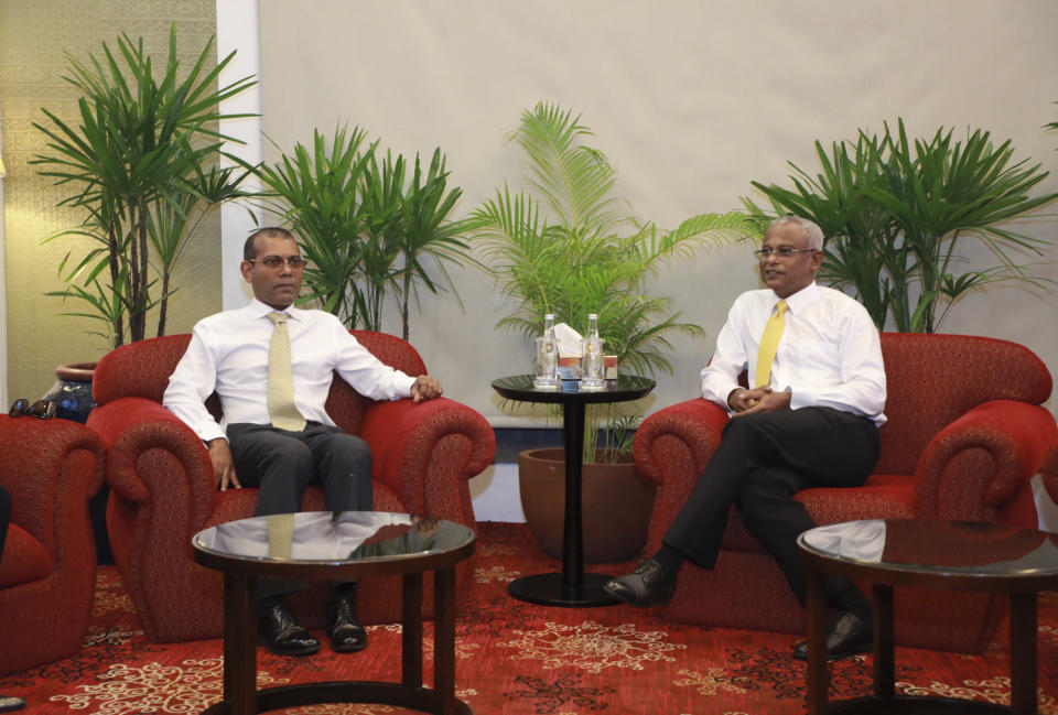 Maldives’ former president Mohamed Nasheed, left,sits with President-elect Ibrahim Mohamed Solih, afterhis arrival at the airport in Male, Maldives, Thursday, Nov.1,2018. Nasheed returned to Maldives Thursday after living in exile for more than two years. (AP Photo/Mohamed Sharuhaan)