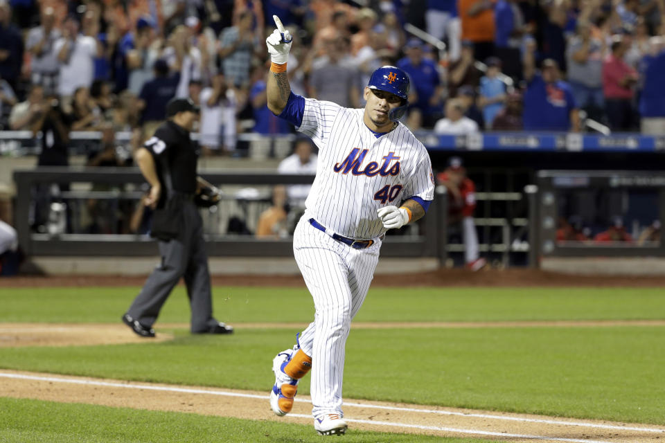 New York Mets' Wilson Ramos reacts after hitting a solo home run during the fourth inning of a baseball game against the Washington Nationals, Saturday, Aug. 10, 2019, in New York. (AP Photo/Seth Wenig)