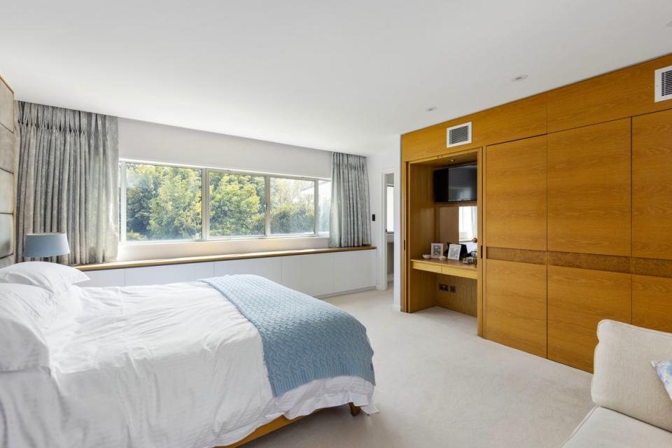 The bedrooms have bespoke built-in cabinetry (Strutt & Parker)