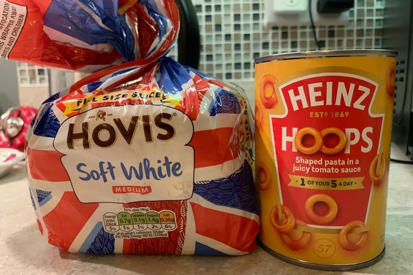 Heinz Spaghetti Hoops (right) and Hovis soft white medium sliced bread (left)