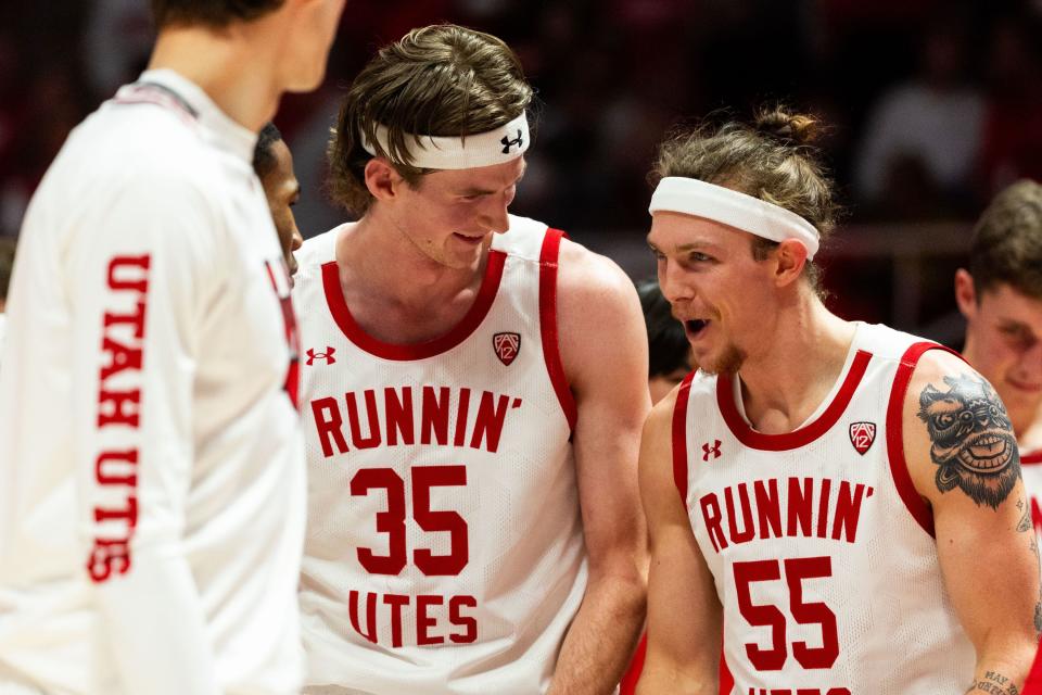 Utah Utes teammates celebrate with Utah Utes guard Gabe Madsen (55) during a timeout after his dunk during the men’s college basketball game between the Utah Utes and the Colorado Buffaloes in Salt Lake City on Saturday, Feb. 3, 2024.