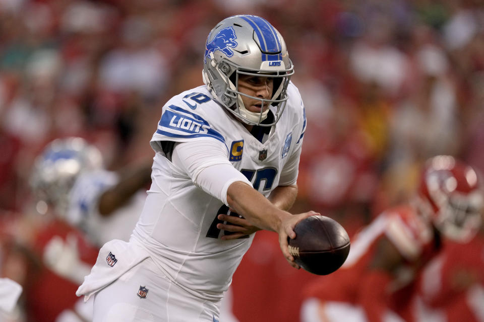 Detroit Lions quarterback Jared Goff hands off during the first half of an NFL football game against the Kansas City Chiefs Thursday, Sept. 7, 2023, in Kansas City, Mo. (AP Photo/Charlie Riedel)