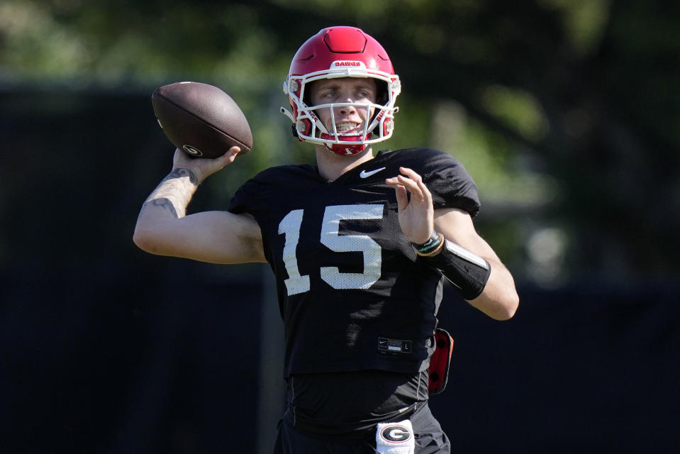 Georgia quarterback Carson Beck (15) does drills as the team prepares for the Orange Bowl NCAA college football game, Wednesday, Dec. 27, 2023, in Miami. Georgia is scheduled to play Florida State in the Orange Bowl Saturday at Hard Rock Stadium in Miami Gardens. (AP Photo/Lynne Sladky)