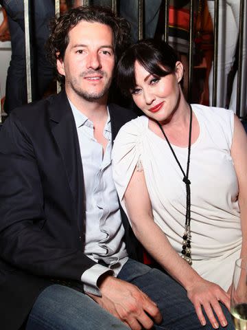 <p>Sara Jaye/Shutterstock</p> Kurt Iswarienko and Shannen Doherty at the US Weekly Annual 'Hot Hollywood Style' Issue Event on April 18, 2012.