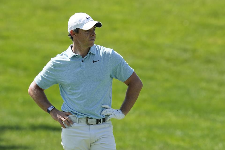 Rory McIlroy, of Northern Ireland, reacts to his shot to the 13th green during the first round of the Memorial golf tournament, Thursday, June 1, 2023, in Dublin, Ohio. (AP Photo/Darron Cummings)