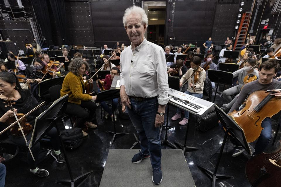 Conductor Benjamin Zander poses before rehearsing Beethoven's Ninth Symphony with the Boston Philharmonic Orchestra in Calderwood Studio at WGBH, Thursday, Feb. 16, 2023, in Boston. (AP Photo/Michael Dwyer)