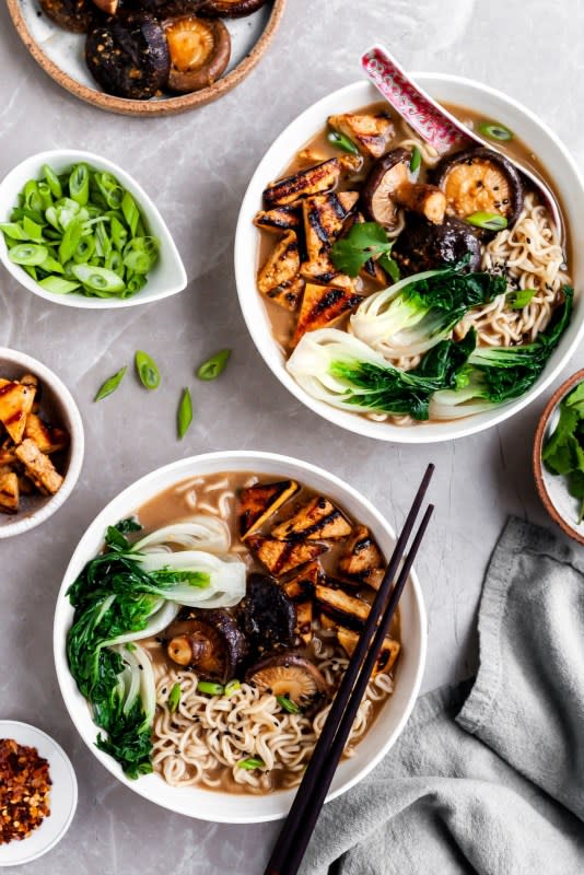 <p>This umami rich shiitake mushroom broth is deepened with miso and toasted sesame. It’s everything satisfying and savory that we all want from an amazing bowl of soup. Grilled marinated tofu and shiitakes take things over the top with chewy noodles, and fresh baby bok choy.</p><p><strong>Get the recipe: <a href="https://crumbsandcaramel.com/vegan-mushroom-miso-ramen/" rel="nofollow noopener" target="_blank" data-ylk="slk:Vegan Mushroom Miso Ramen with Bok Choy;elm:context_link;itc:0;sec:content-canvas" class="link rapid-noclick-resp"><em>Vegan Mushroom Miso Ramen with Bok Choy</em></a></strong></p>