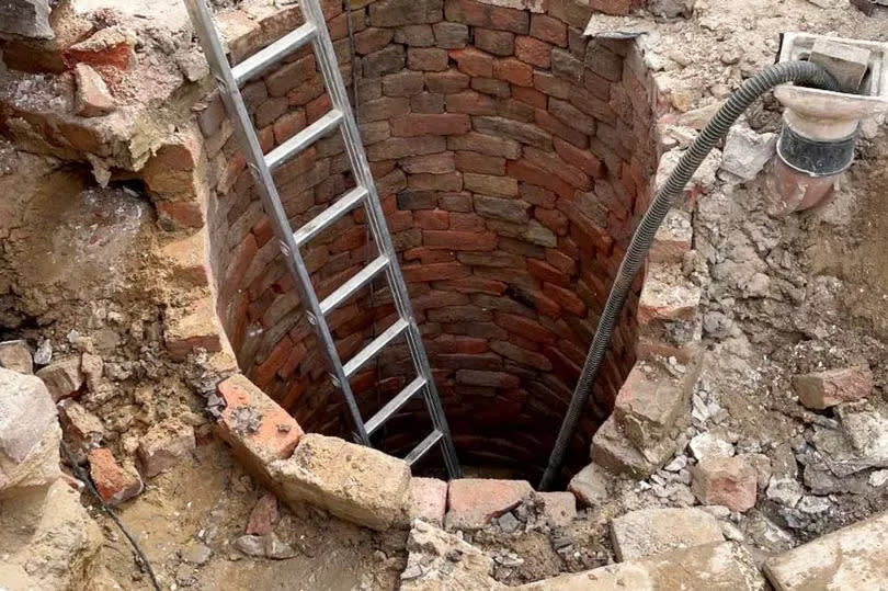The couple believe the well could date back to the 17th century