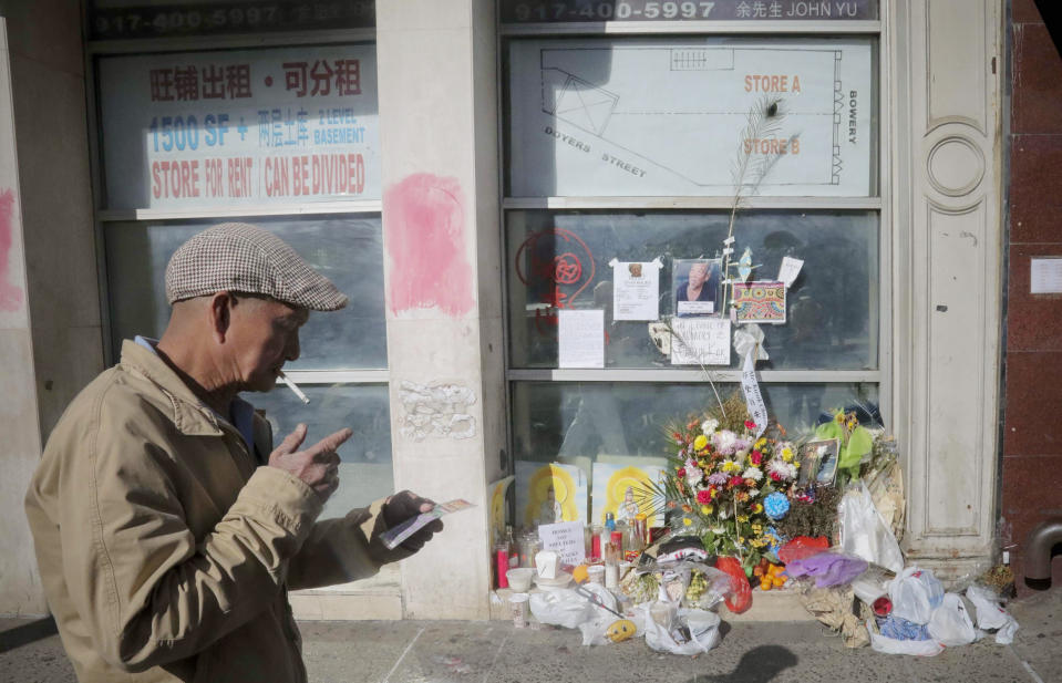 REMOVES REFERENCE TO HOMELESS KILLED - A makeshift memorial stands for Chuen Kok, Friday Oct. 18, 2019, in New York. Kok, an 83-year-old homeless man whom Chinatown residents warmly greeted as "uncle," was one of four men bludgeoned to death in the community last week. (AP Photo/Bebeto Matthews)