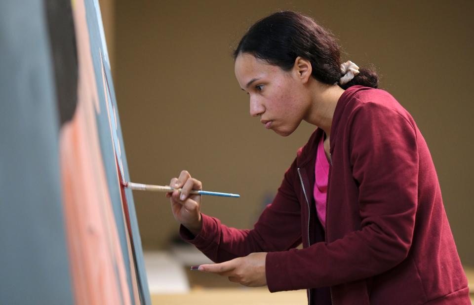 Janely Saavedra Cruz works on her mural for this year's Fresh Paint: OKC NYE Mural Project at the OKC Farmers Public Market Monday, November 7, 2022.