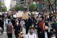 Protesters rally against the death in Minneapolis police custody of George Floyd in San Francisco