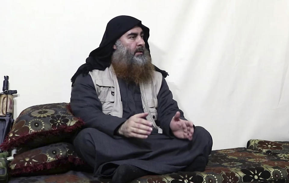 This image made from video posted on a militant website on Monday, April 29, 2019, purports to show the leader of the Islamic State group, Abu Bakr al-Baghdadi, being interviewed by his group's Al-Furqan media outlet. Al-Baghdadi acknowledged in his first video since June 2014 that IS lost the war in the eastern Syrian village of Baghouz that was captured last month by the Kurdish-led Syrian Democratic Forces. (Al-Furqan media via AP)