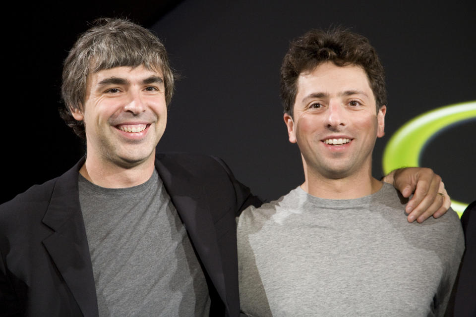 Larry Page (L) and Sergey Brin (R), the co-founders of Google, at a press event where Google and T-Mobile announced the first Android powered cellphone, the T-Mobile G1. (Photo by James Leynse/Corbis via Getty Images)