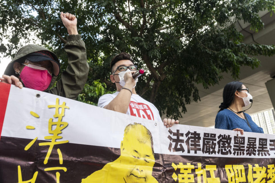 Pro-China supporters demand for Jimmy Lai to be imprisoned as they gather outside the court in Hong Kong, China. 