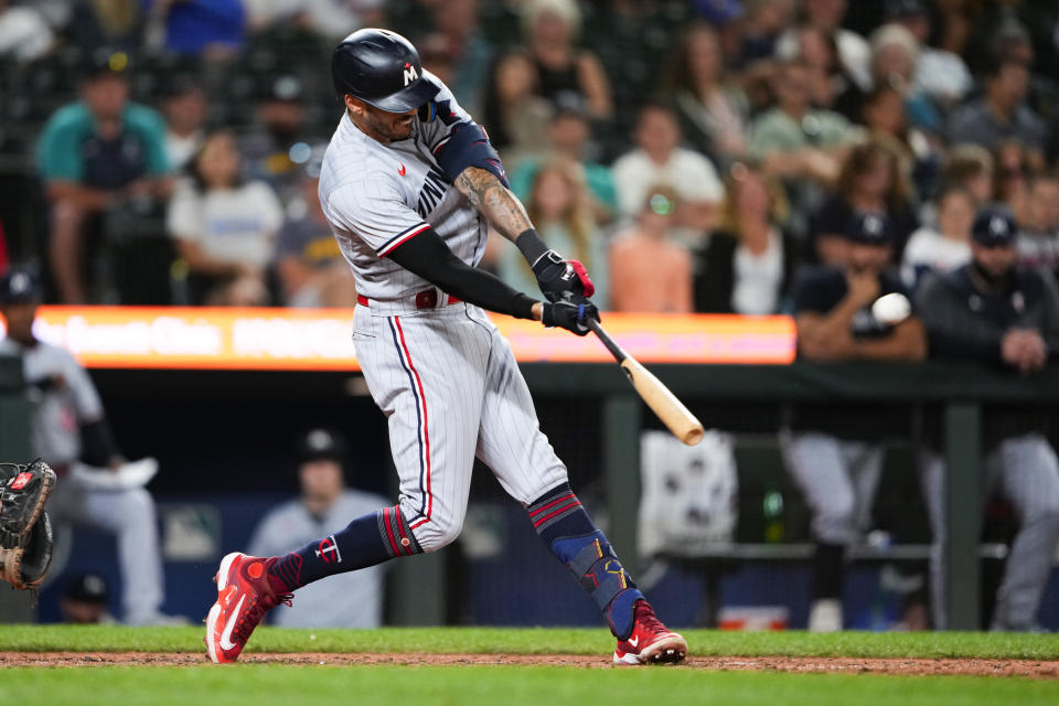 Minnesota Twins' Carlos Correa hits a home run against the Seattle Mariners during the ninth inning of a baseball game Tuesday, July 18, 2023, in Seattle. The Twins won 10-3. (AP Photo/Lindsey Wasson)