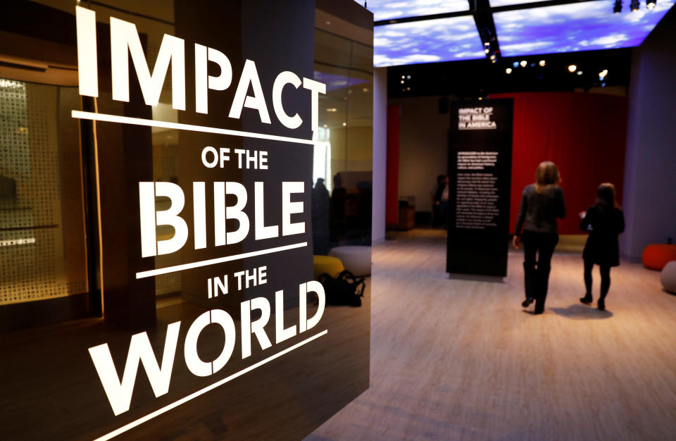 Visitors enter an exhibition at the Museum of the Bible during a preview day. (Photo: Kevin Lamarque/Reuters)