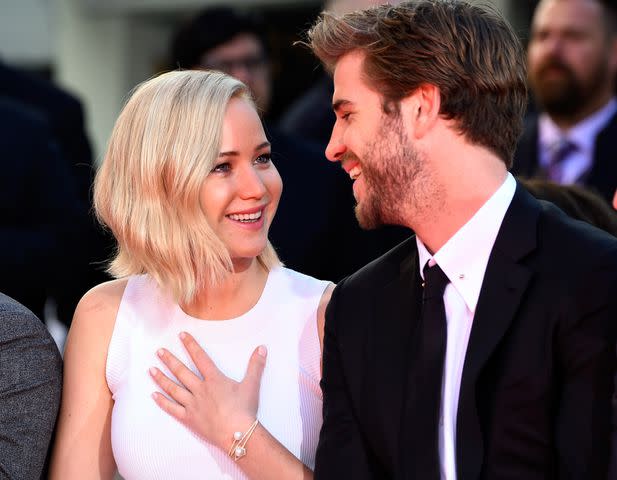 <p>Frazer Harrison/Getty</p> Jennifer Lawrence and Liam Hemsworth in 2015.