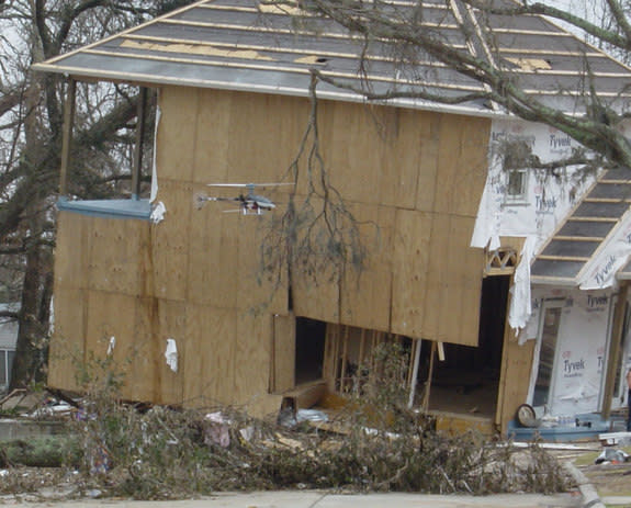 An unmanned aerial vehicle searches wreckage for survivors in Pearlington, Miss., following Hurricane Katrina. The vehicle was operated by the Safety Security Rescue Research Center, one of the U.S. National Science Foundation's Industry-Univer