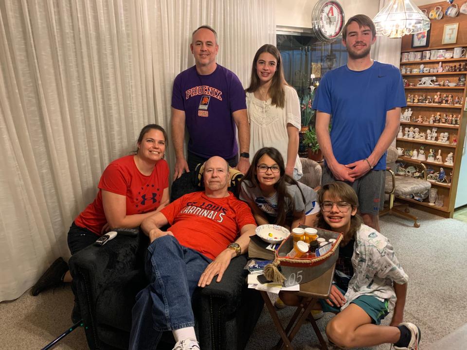 Luke Macy at his childhood home with his grandfather, siblings, and parents.