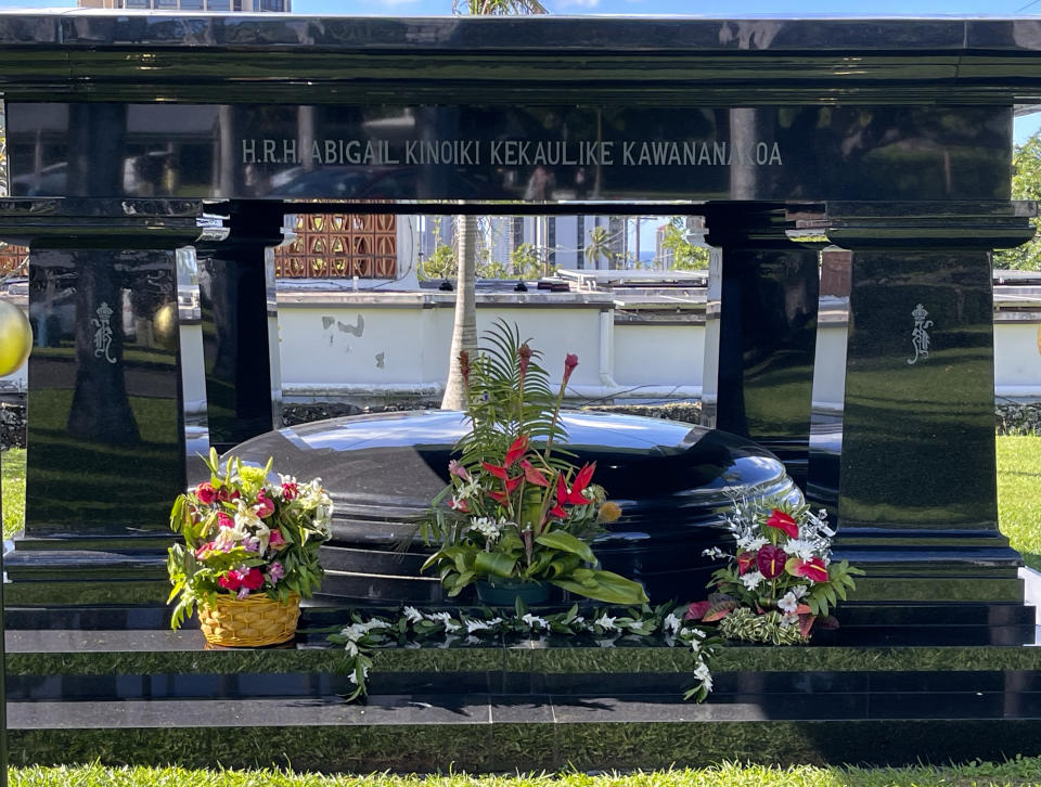 In this Jan. 2, 2024, photo provided by Naleen N. Andrade, flowers adorn the crypt of Abigail Kawānanakoa at Mauna ʻAla, also known as Royal Mausoleum State Monument, which is the burial place of Hawaiian royalty, in Honolulu. There will be at least $100 million leftover to fund Native Hawaiian causes from estate of Kawānanakoa. (Naleen N. Andrade via AP)