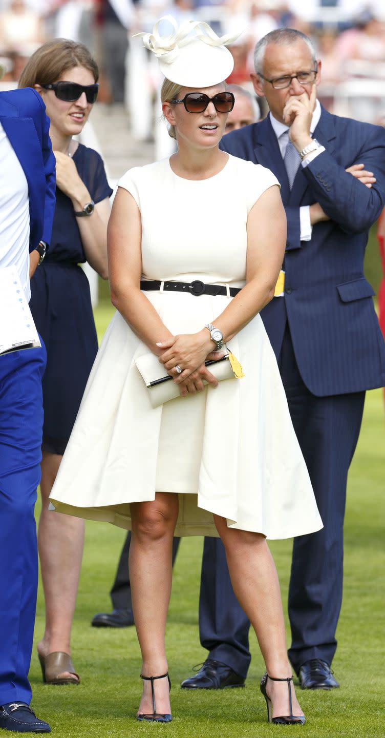 <p>Zara Phillips selected a creamy white ensemble to watch her grandmother, Queen Elizabeth II's, horse run in the Artemis Goodwood Cup at Goodwood Racecourse.</p>