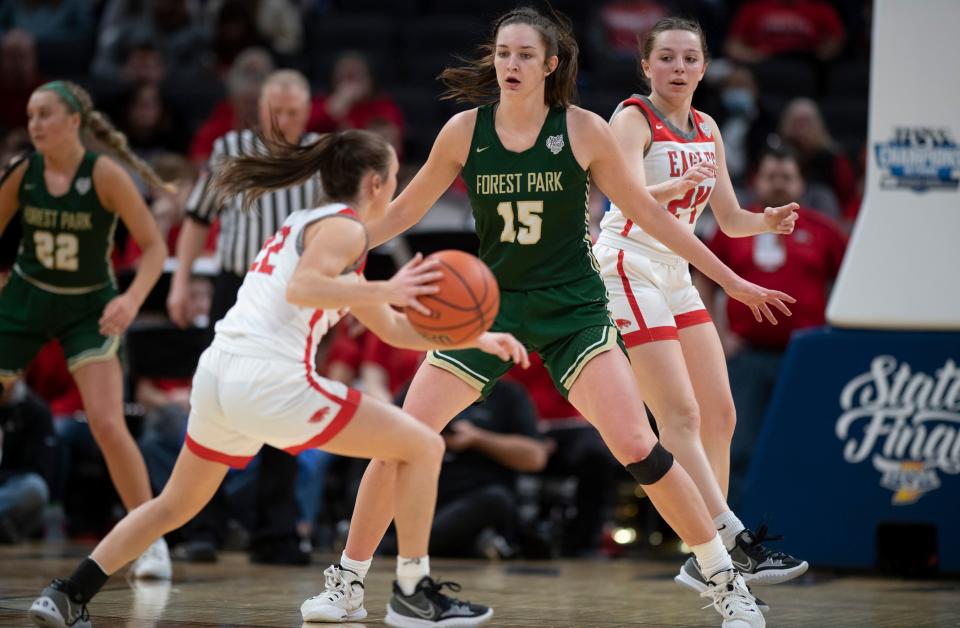 Forest Park's Amber Tretter (15) guards Frankton's Cagney Utterback (22) as Bailee Webb (24) looks for the pass during the IHSAA girls basketball Class 2A state championship at Gainbridge Fieldhouse in Indianapolis, Ind., Saturday afternoon, Feb. 26, 2022.