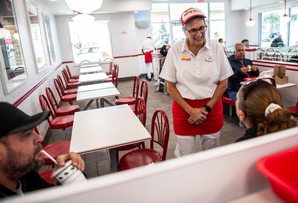 Tracey Cox chats with customers about their order during the opening of Colorado's new In-N-Out location in Loveland on Nov. 10.