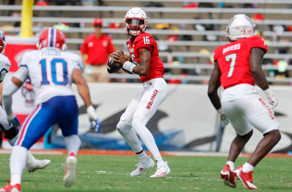 N.C. State quarterback CJ Bailey (16) looks for receivers downfield during the first half of N.C. State’s game against LA Tech at Carter-Finley Stadium in Raleigh, N.C., Saturday, Sept. 14, 2024.