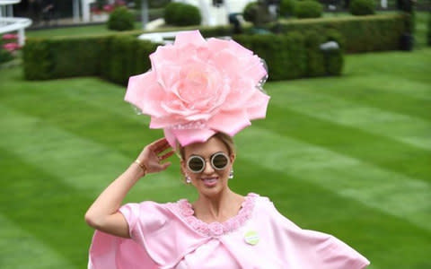  a racegoer sporting some striking floral-themed headgear on Ladies’ Day 2017 - Credit: Getty