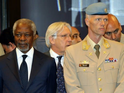 UN-Arab League peace envoy Kofi Annan (L) stands next to UN mission chief in Syria, Major General Robert Mood, ahead of a press conference in Damascus on May 29. China on Wednesday restated its opposition to military intervention in Syria, as Russia sought to halt fresh UN Security Council action after a massacre of civilians sparked global fury