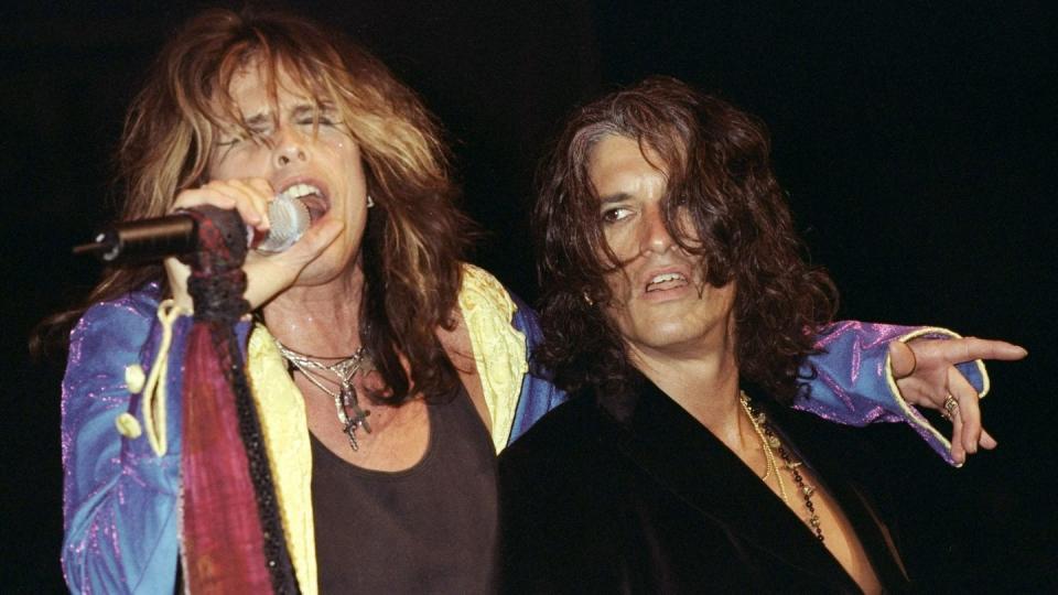 steven tyler and joe perry of aerosmith performing at z 100 