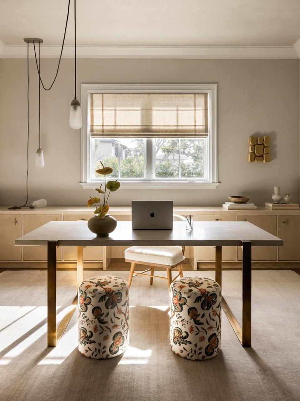 office with desk and two stools