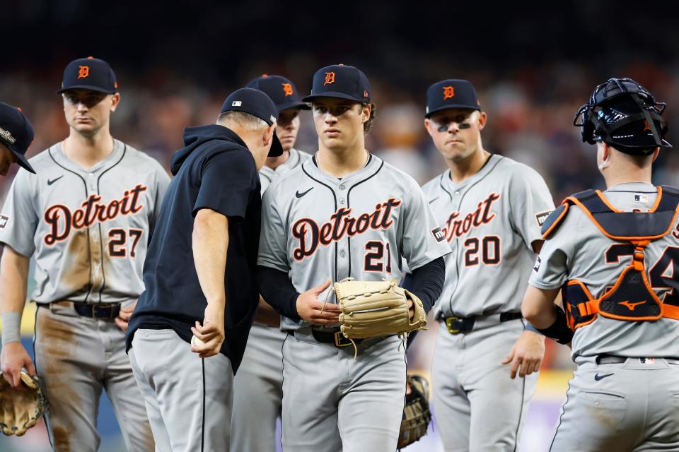 Detroit Tigers manager A.J. Hinch relieves Jackson Jobe, center, in the seventh inning against the Houston Astros during Game 2 of the wild-card series at Minute Maid Park on Oct. 2, 2024 in Houston.